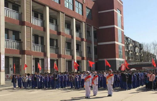 濮阳市油田第二小学举行 学党史 强信念 跟党走 主题升旗仪式
